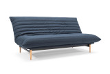 Colpus 140 Sofa Bed Quiltus v tkanini 528 Mixed Dance Blue z nogami v naravni barvi hrasta – moder kavč z ležiščem 140 × 200 cm
