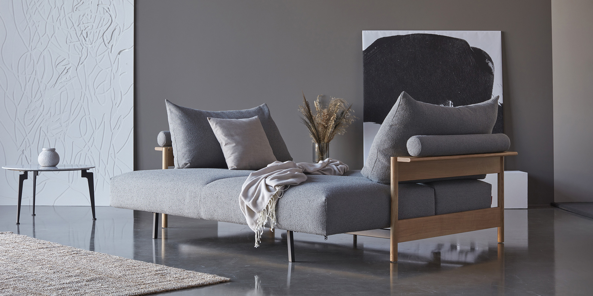 Raztegljiv kavč Malloy Wood Sofa Bed v tkanini 533